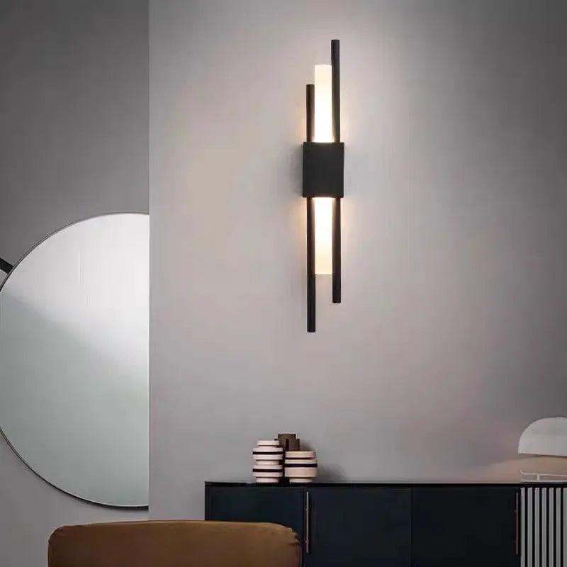 Metalen wandlamp Adan met verstelbare arm in zwart of goud - industrieel design
